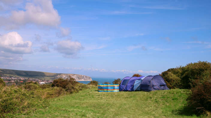 Informal-camping-pitches-with-views-of-Swanage-Bay